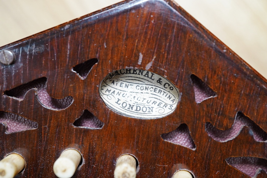 A mid-19th century Lachenal & Co., London mahogany concertina, in an hexagonal mahogany case. Condition - fair to good, the leatherwork on the bellows appears sound and strong.